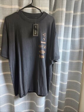 Primitive Black wash Short-Sleeve Tee with Tan Graphic